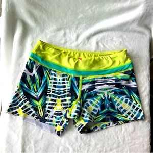 Pink Lotus Woman’s athletic workout shorts